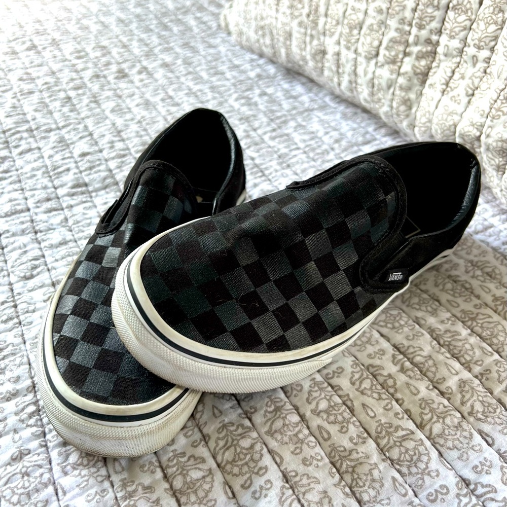 VANS BLACK CHECKERED SLIP-ONS